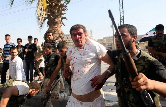 اعدام‌شهروندان به جرم‌حمایت از اسد+عکس