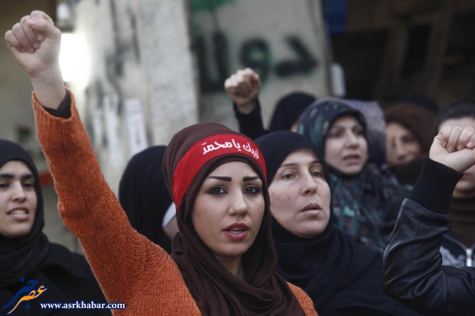 عکس: اعتراض زن مسلمان به نشریه فرانسوی