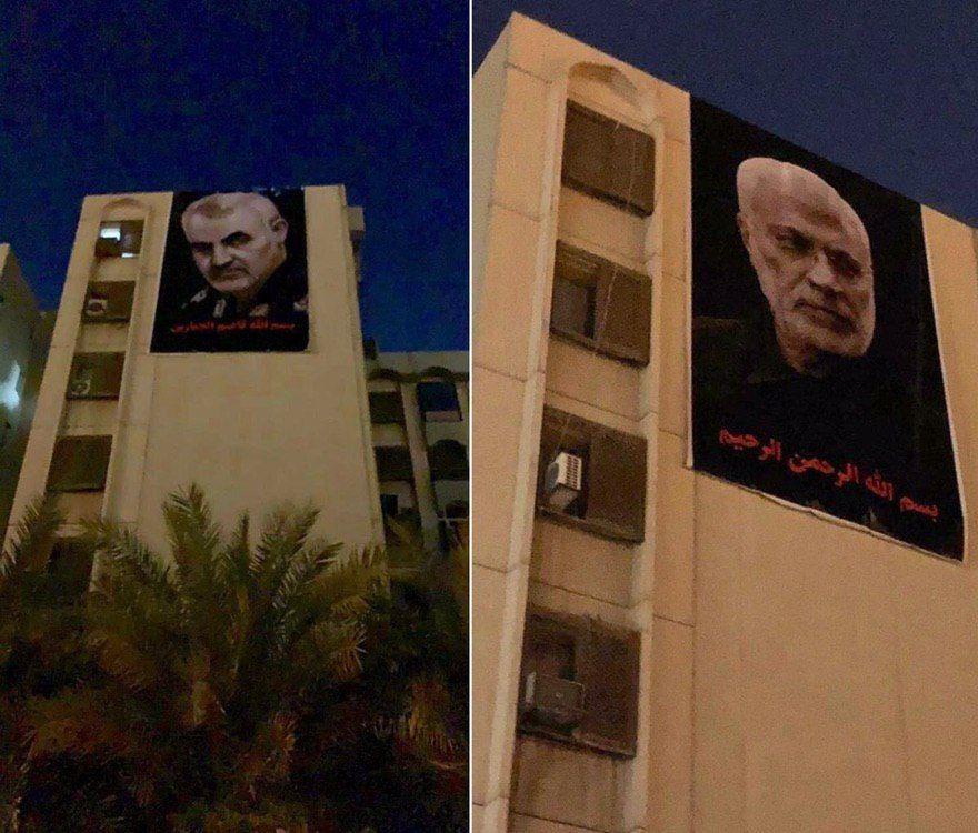 تصاویر سردار شهید «قاسم سلیمانی» و شهید«ابومهدی» بر ساختمان روبروی سفارت آمریکا در بغداد