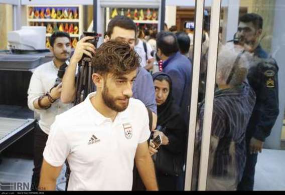 بازگشت تیم ملی فوتبال ایران از روسیه (عکس)
