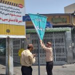 جمع آوری بنر پزشکیان توسط کارگران شهرداری تهران